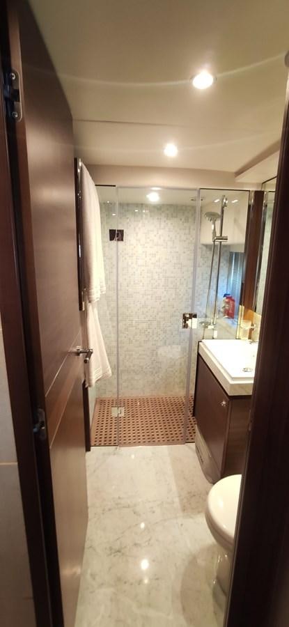 a bathroom with a shower and sink aboard ANOTHER TOY Yacht for Sale