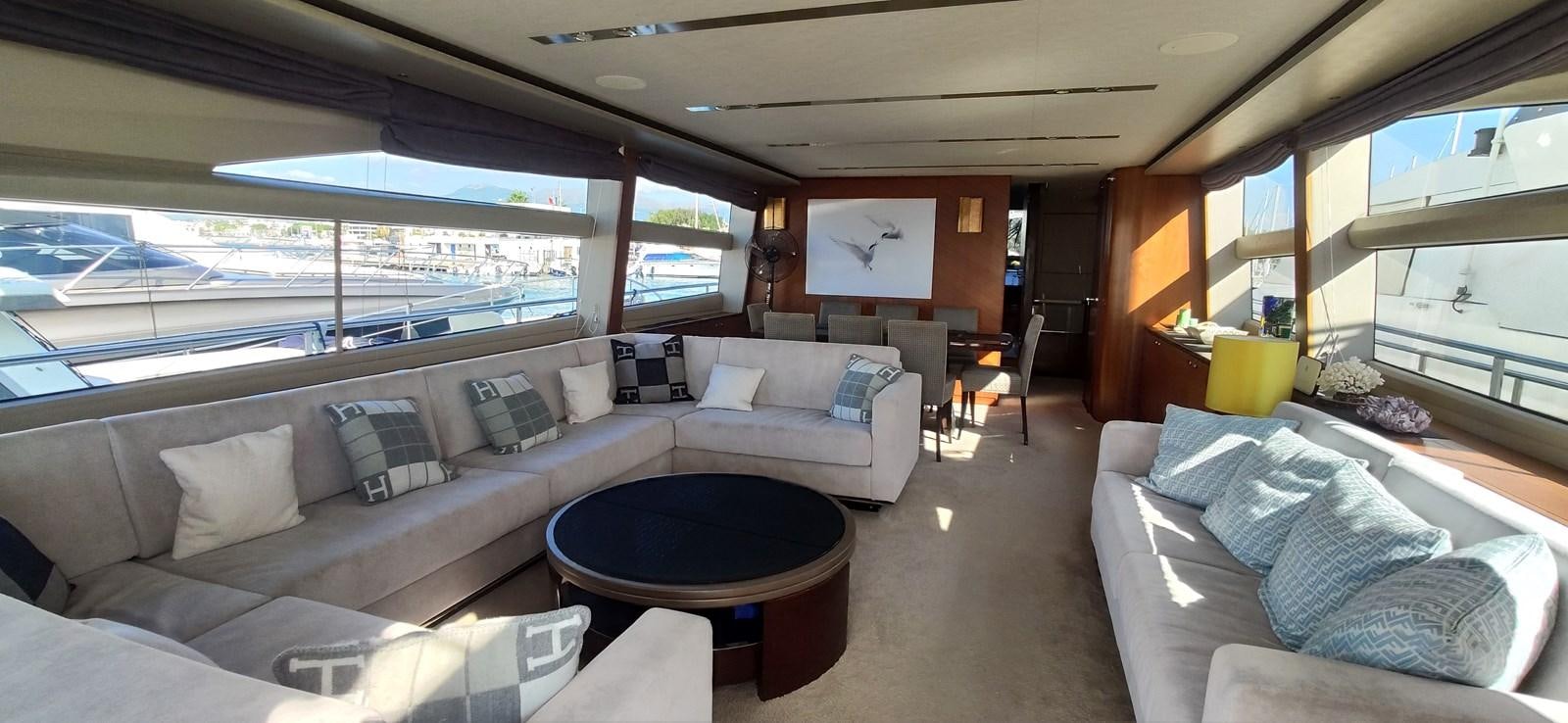 a living room with a large window aboard ANOTHER TOY Yacht for Sale