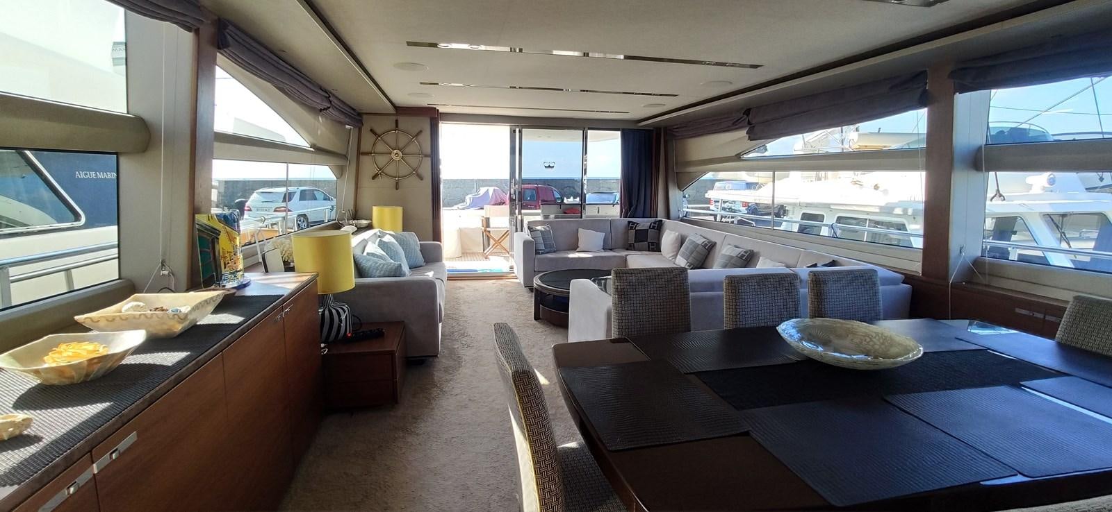 a room with a table and chairs aboard ANOTHER TOY Yacht for Sale