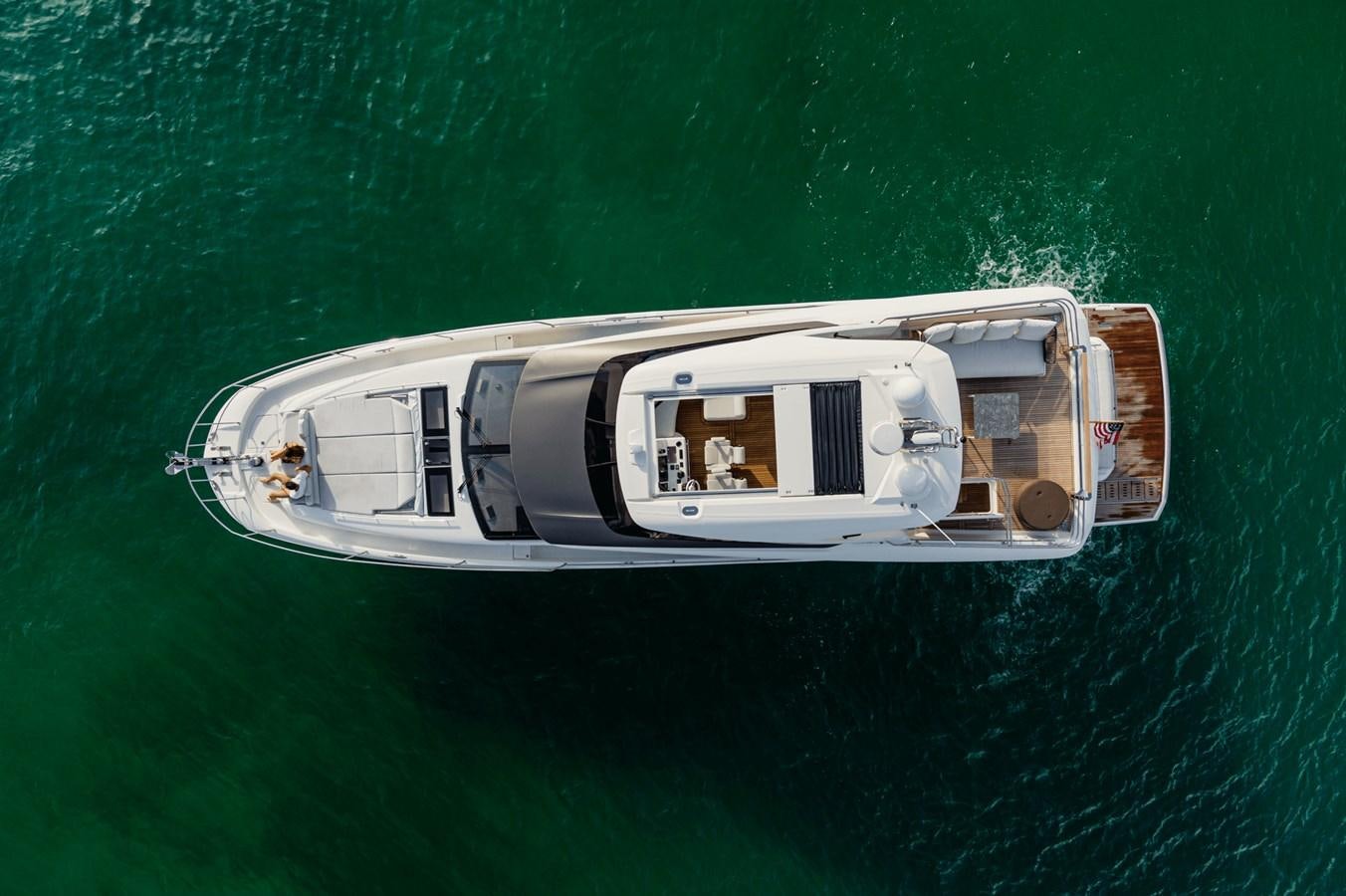 a boat in the water aboard 2021 PRESTIGE YACHTS 690 FLYBRIDGE Yacht for Sale