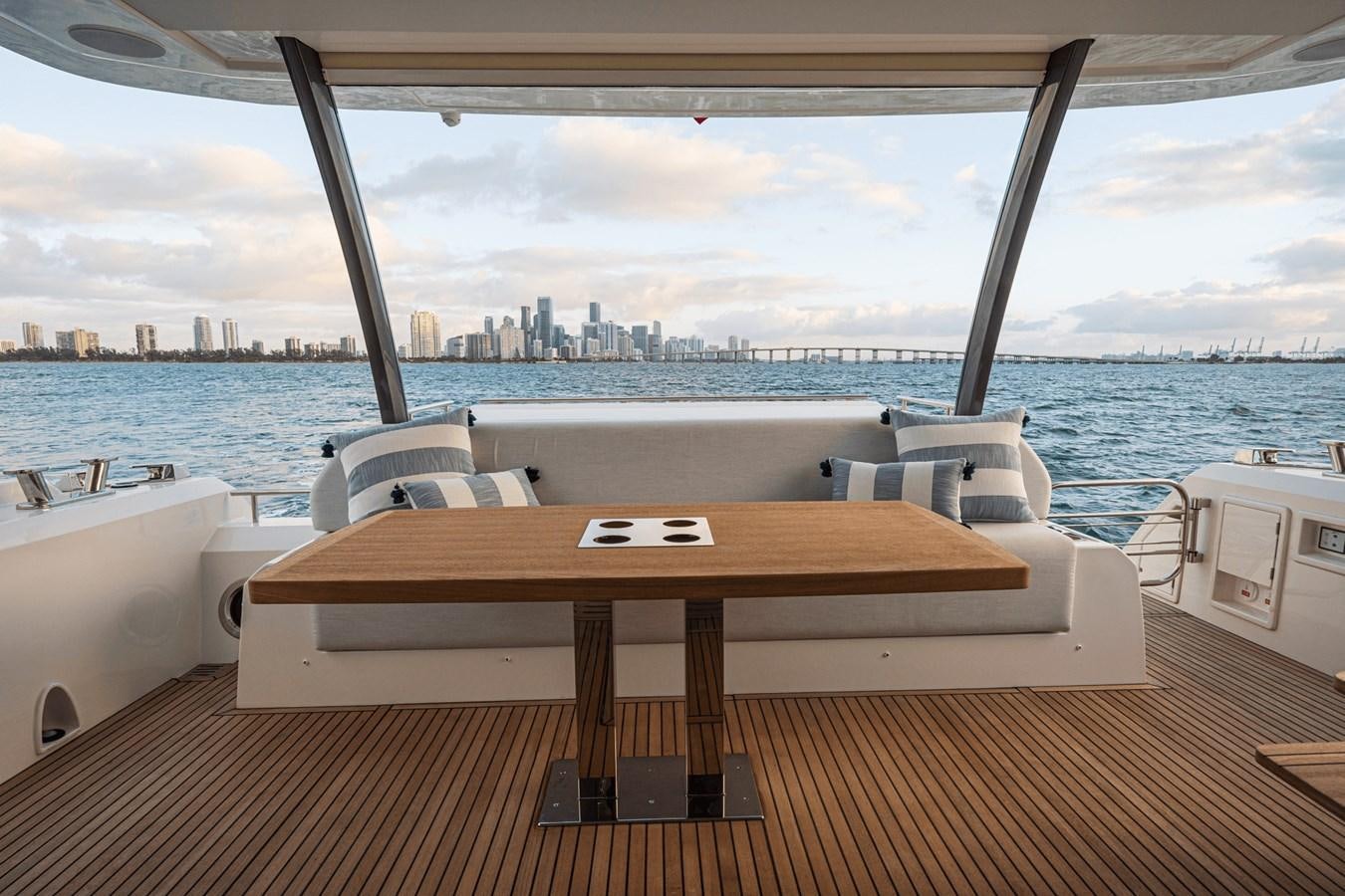 a table on a boat aboard 2021 PRESTIGE YACHTS 690 FLYBRIDGE Yacht for Sale