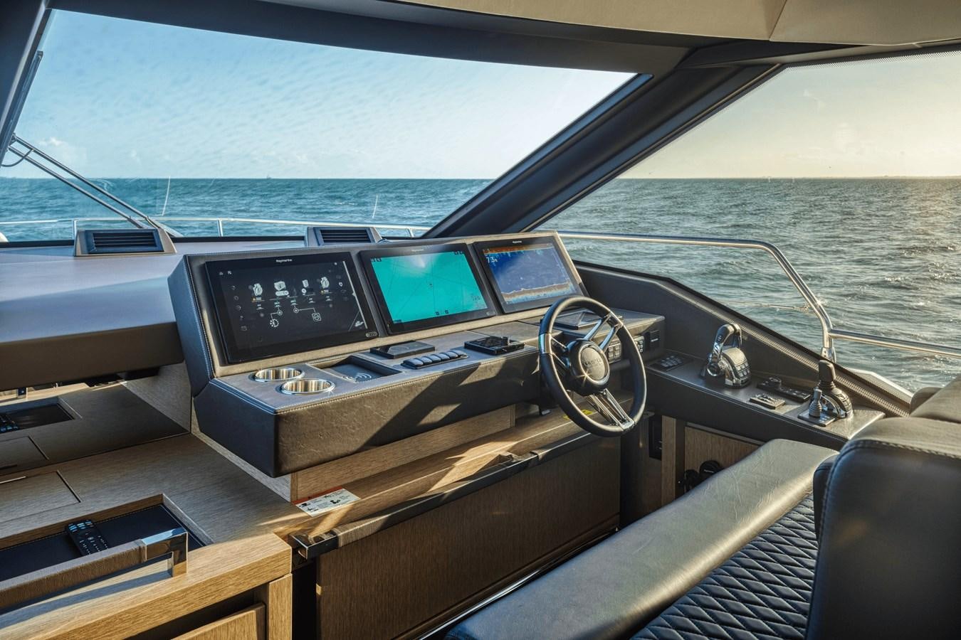 a boat with a couple of monitors aboard 2021 PRESTIGE YACHTS 690 FLYBRIDGE Yacht for Sale