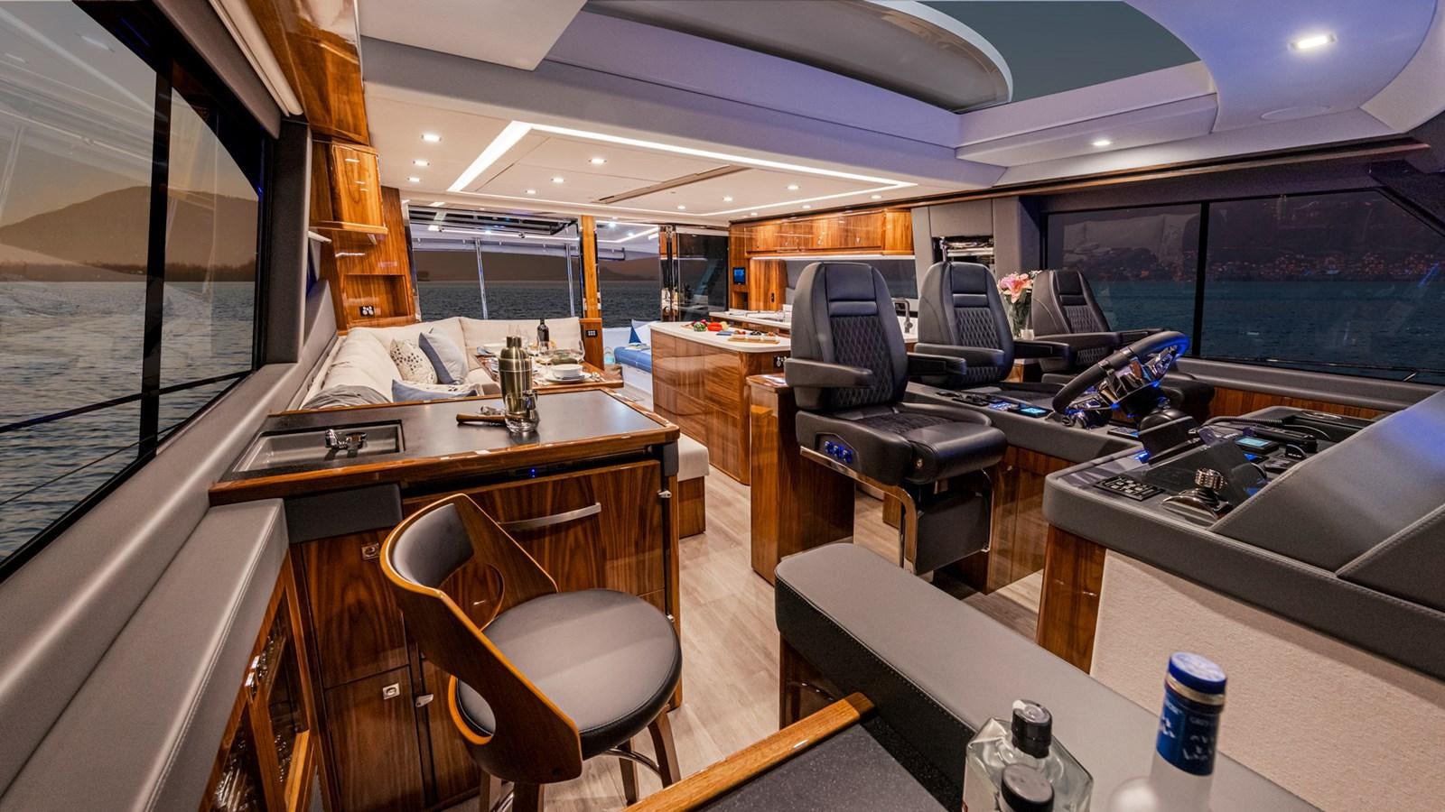 inside of a building with a table and chairs aboard 645 SUV Yacht for Sale