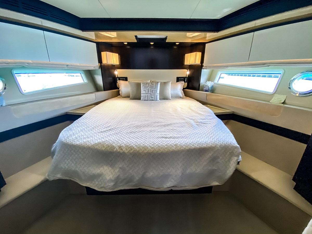 a bed in a room aboard CERULEAN Yacht for Sale