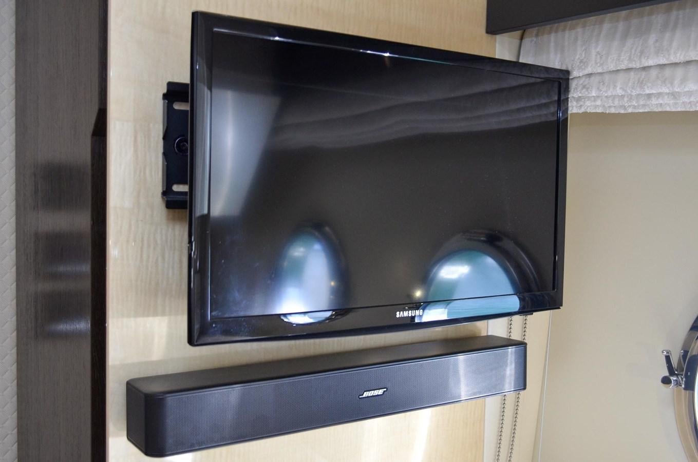 a tv on a stand aboard CERULEAN Yacht for Sale