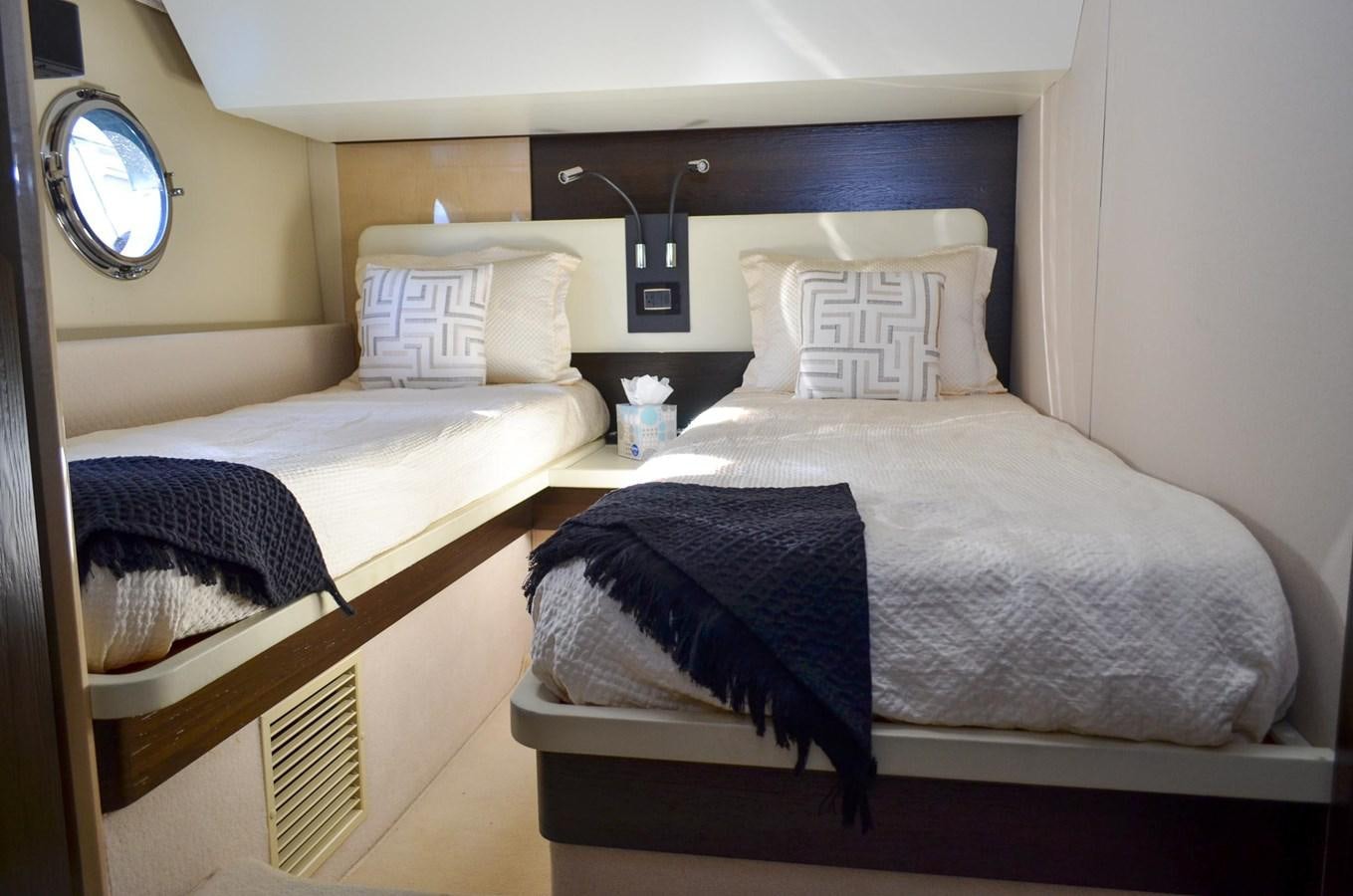 two beds in a room aboard CERULEAN Yacht for Sale