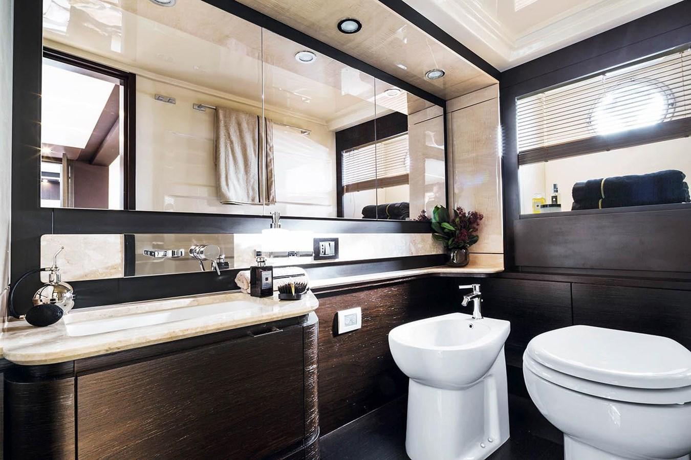 a bathroom with a large mirror aboard CERULEAN Yacht for Sale