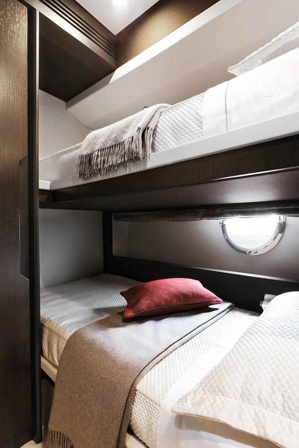 a couple of beds in a room aboard CERULEAN Yacht for Sale