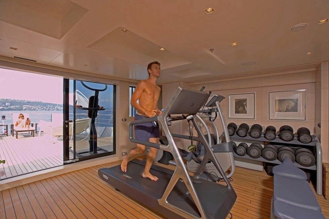 a person working out in a gym aboard BURKUT Yacht for Sale