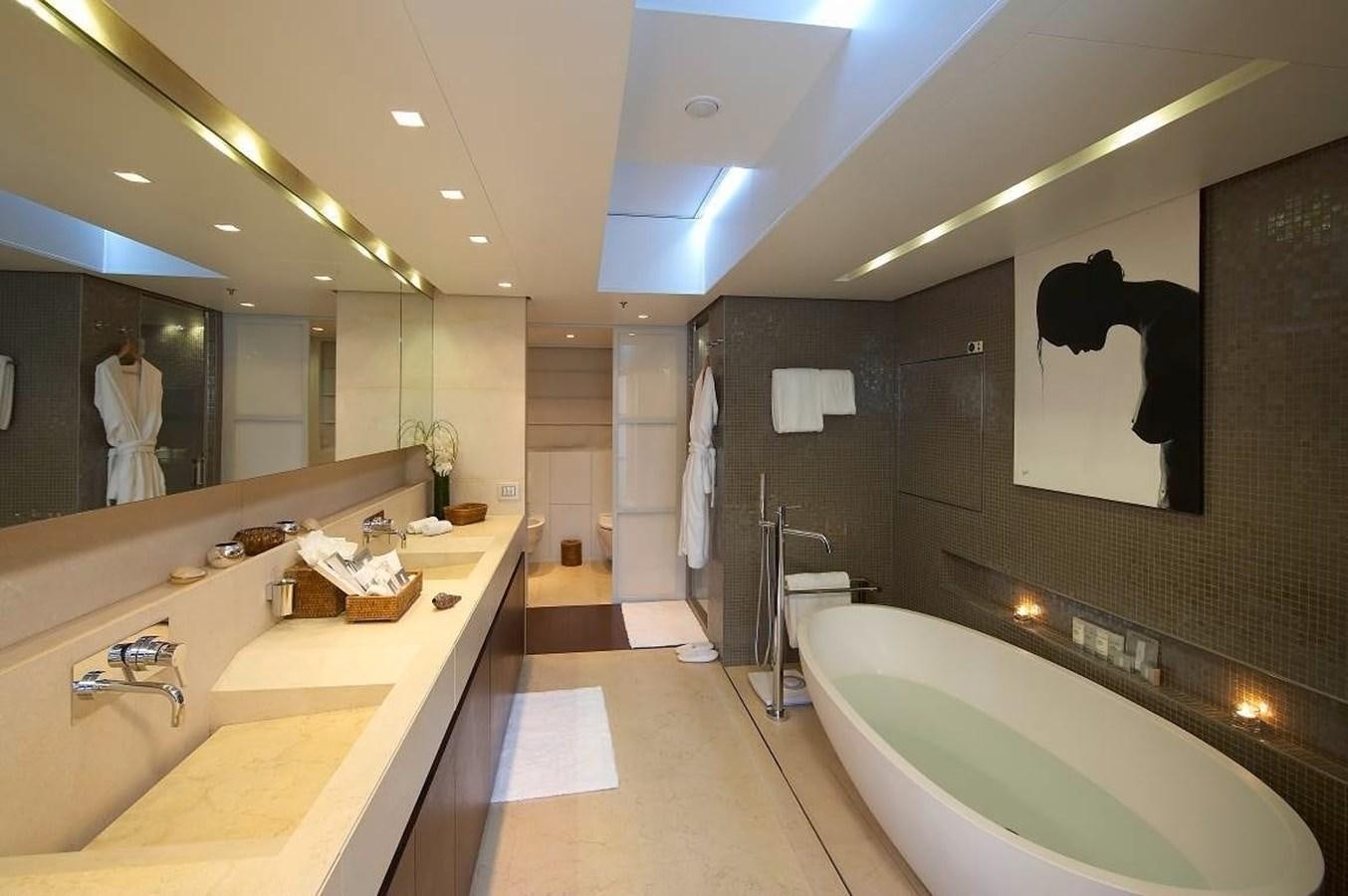 a bathroom with a large mirror aboard BURKUT Yacht for Sale
