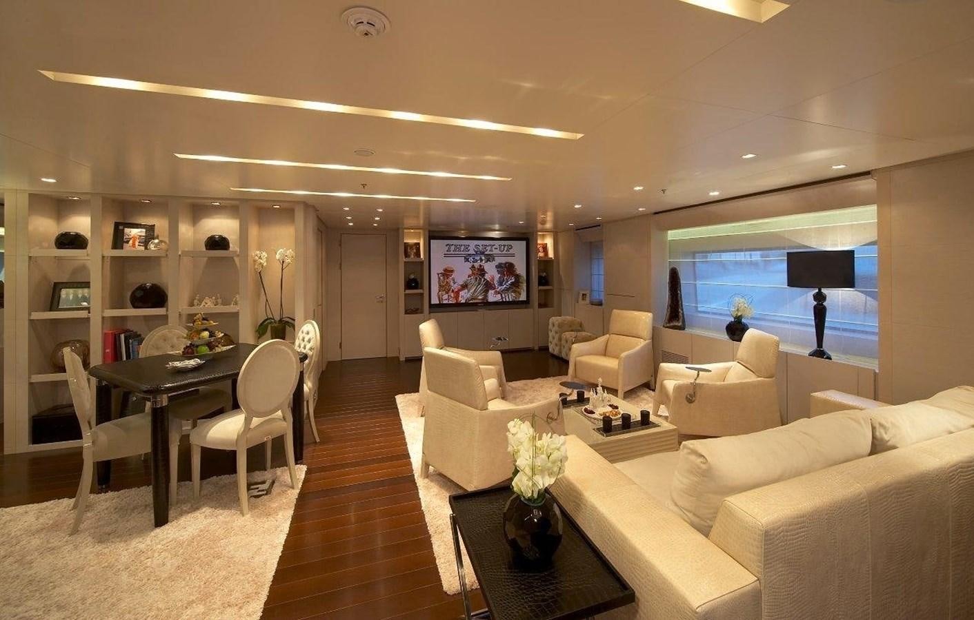 a living room with a large window aboard BURKUT Yacht for Sale