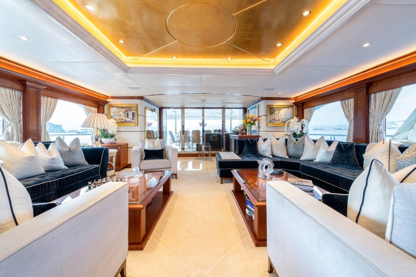 a living room with a large window aboard WHITE STAR Yacht for Sale