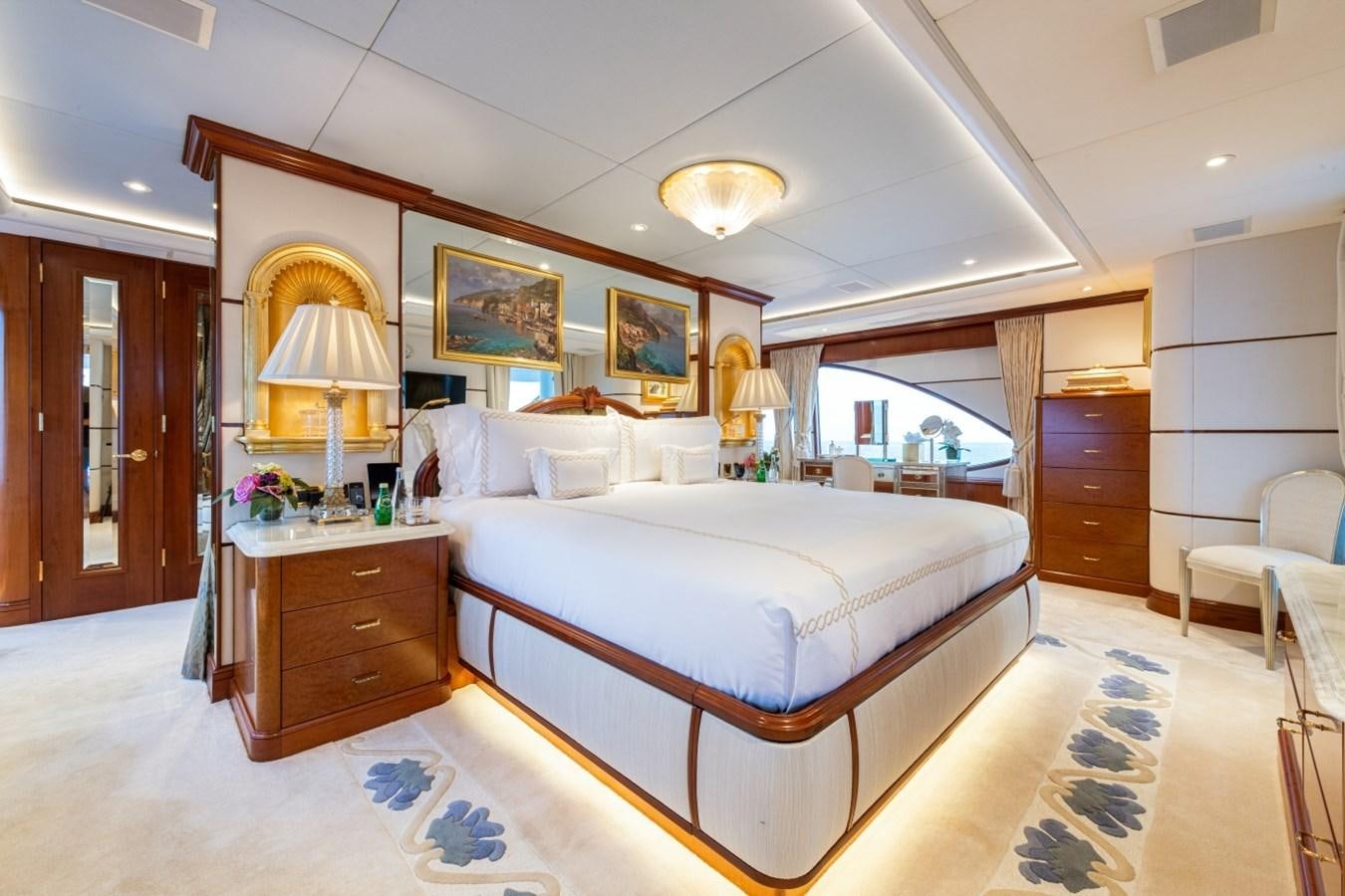 a bedroom with a large bed aboard WHITE STAR Yacht for Sale