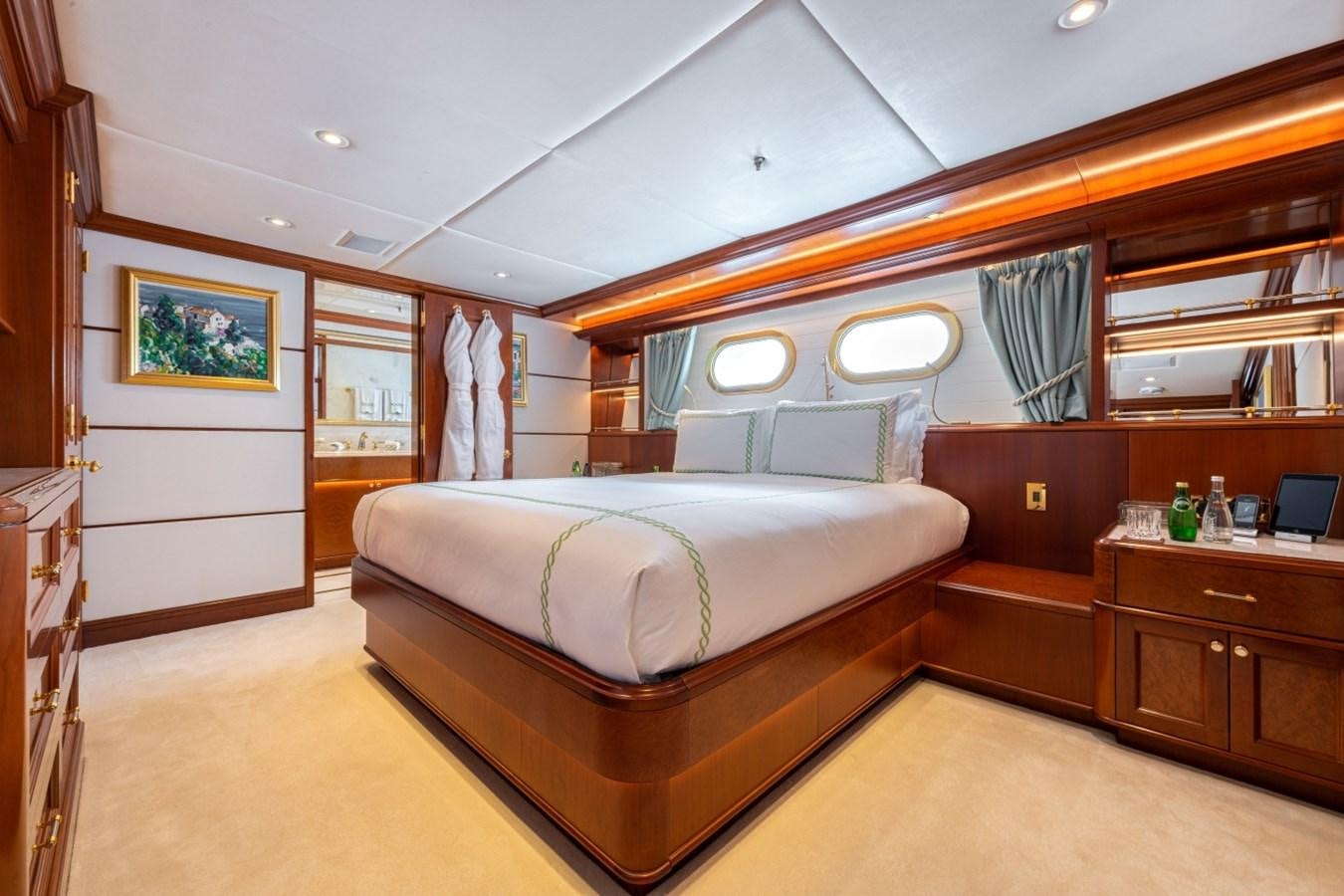 a bedroom with a bed aboard WHITE STAR Yacht for Sale