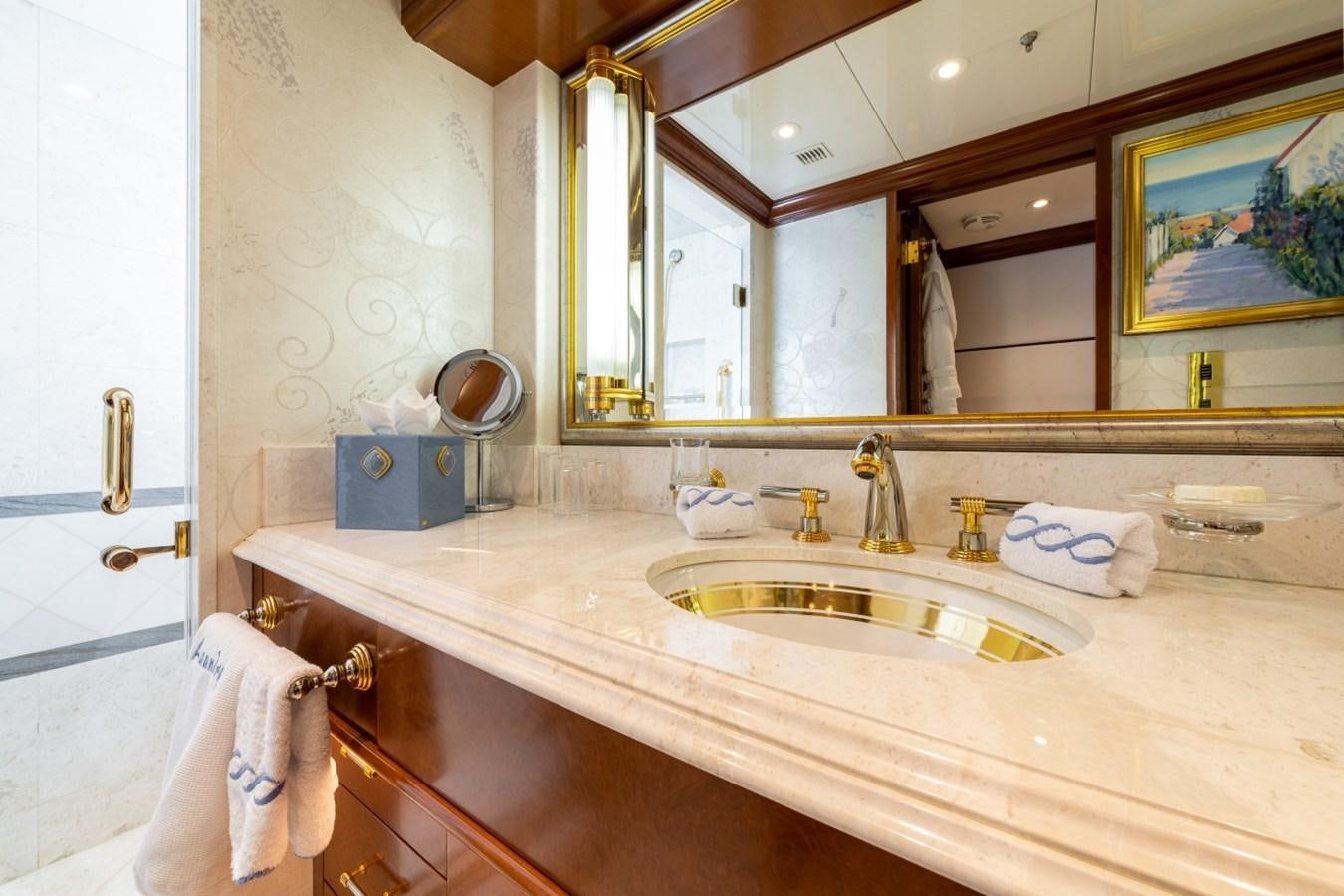 a bathroom with a large mirror aboard WHITE STAR Yacht for Sale