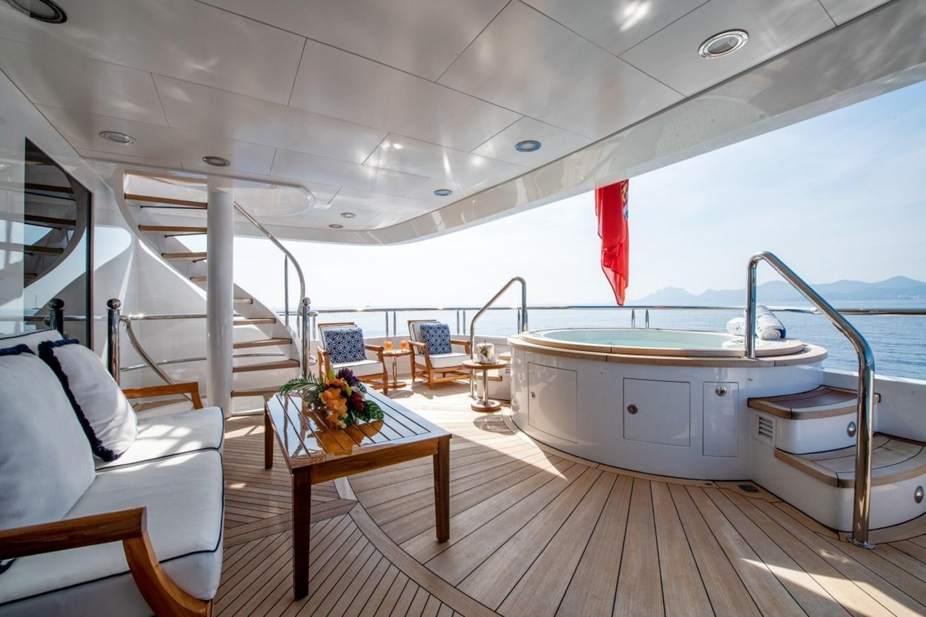 a boat with a table and chairs aboard WHITE STAR Yacht for Sale