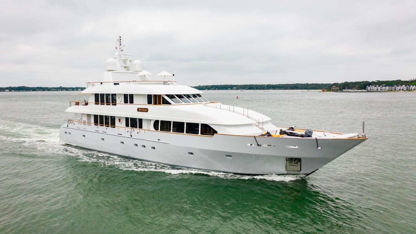 a large white boat in the water aboard PACKAGE DEAL Yacht for Sale