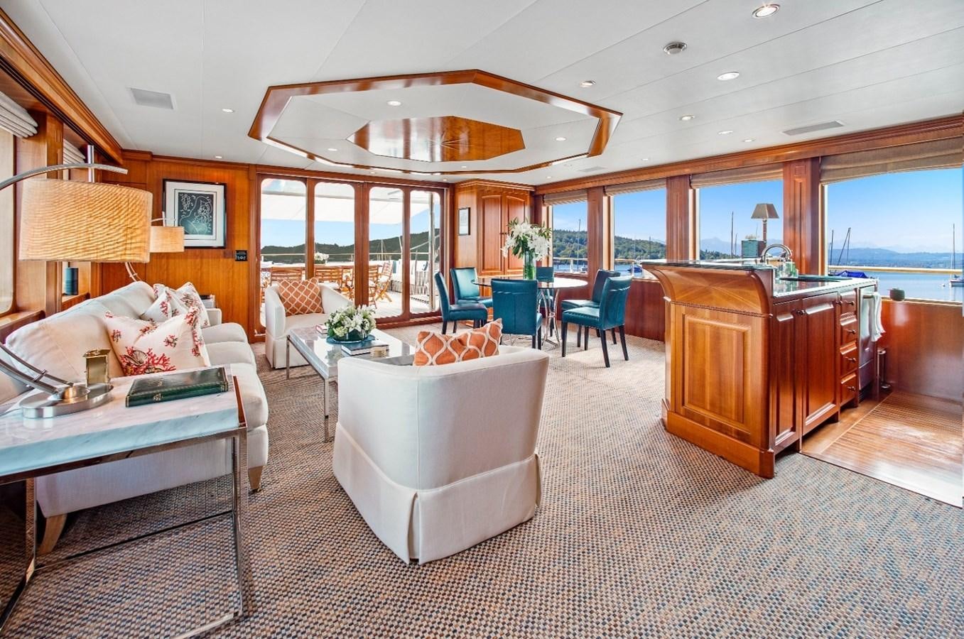 a living room with a large window aboard PACKAGE DEAL Yacht for Sale