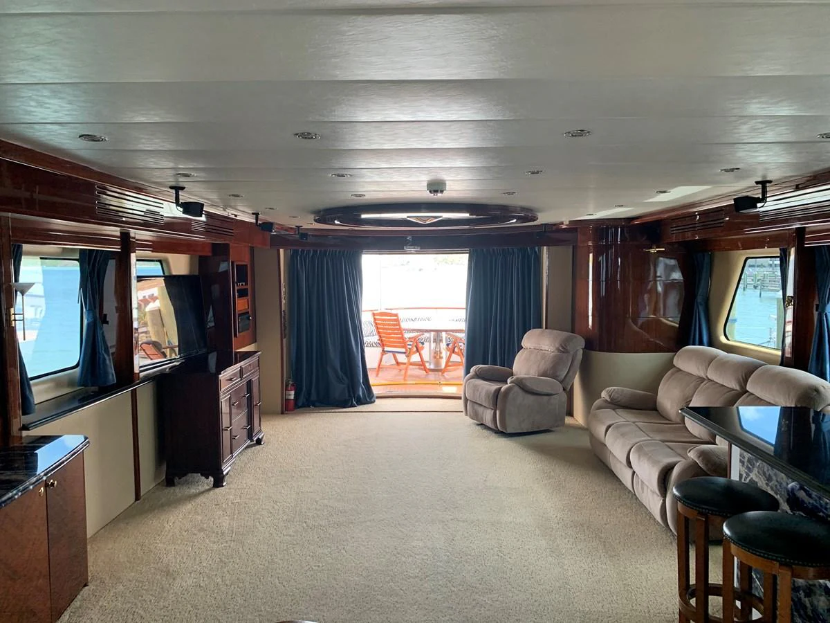 a living room with a large screen aboard 117 BILGIN YACHTS 2007 Yacht for Sale