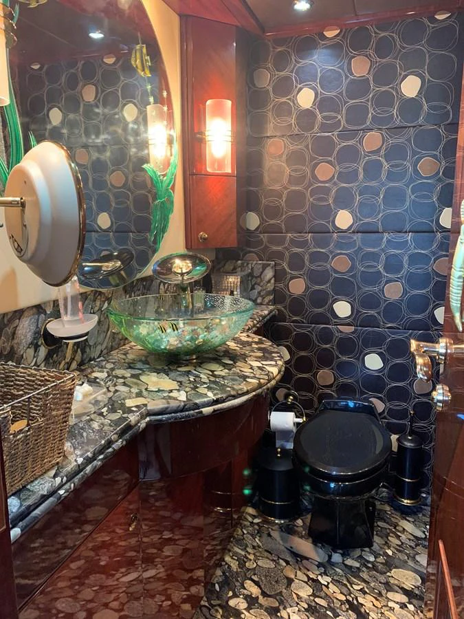 a bathroom with a sink and a mirror aboard 117 BILGIN YACHTS 2007 Yacht for Sale