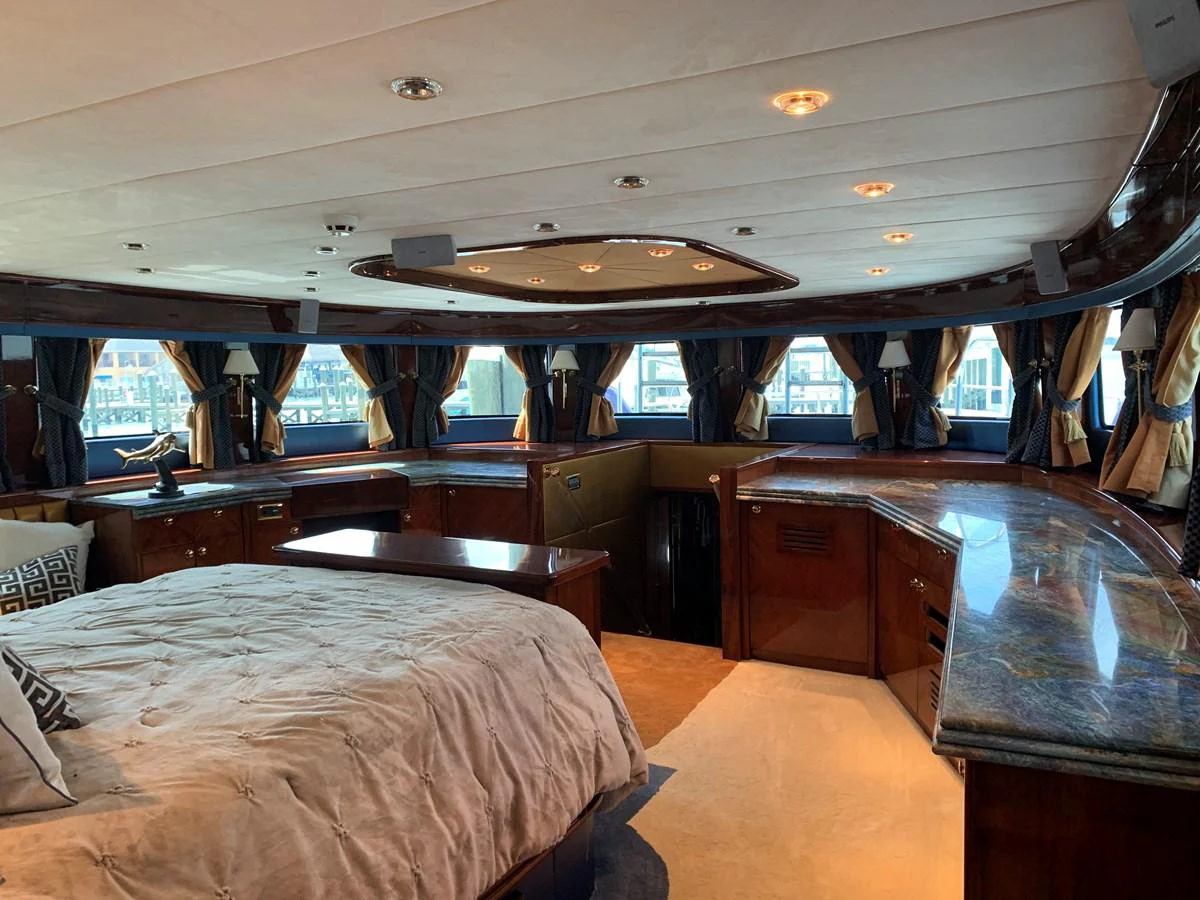 a room with a bed and a table aboard 117 BILGIN YACHTS 2007 Yacht for Sale