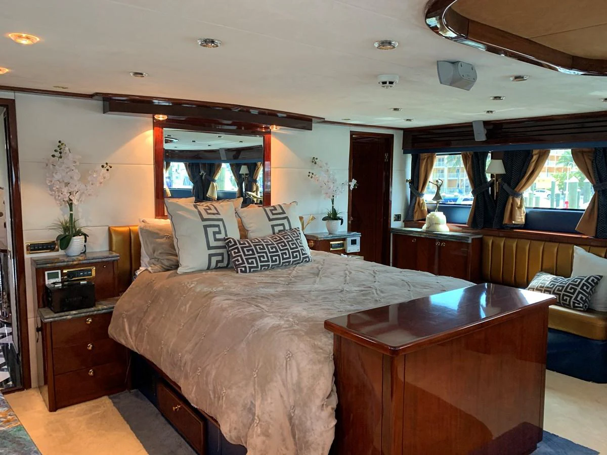 a bedroom with a bed and a desk aboard 117 BILGIN YACHTS 2007 Yacht for Sale