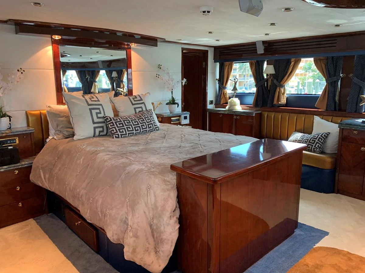 a bedroom with a bed and a desk aboard 117 BILGIN YACHTS 2007 Yacht for Sale