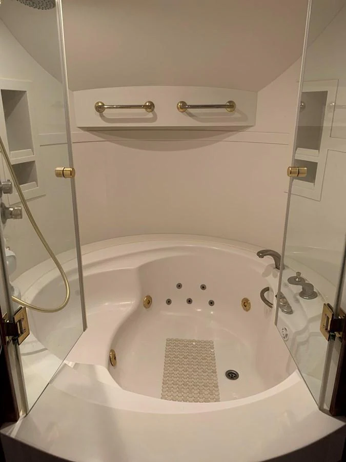 a bathtub with a shower head aboard 117 BILGIN YACHTS 2007 Yacht for Sale