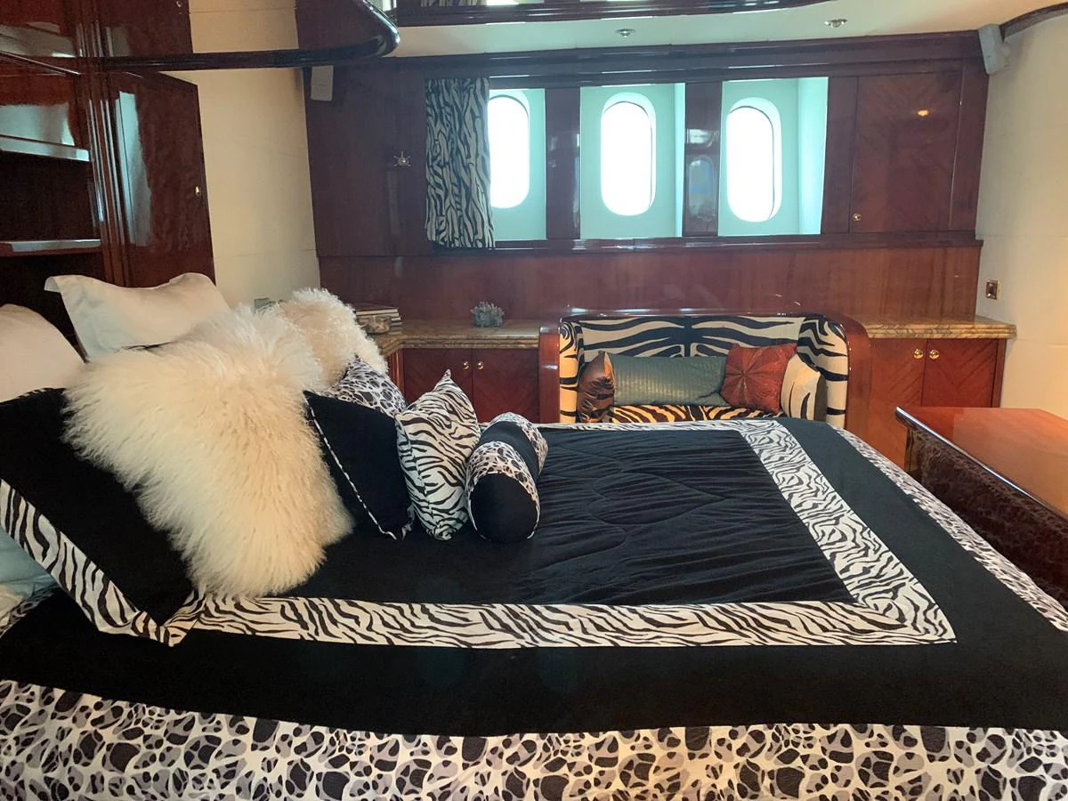 a bed with pillows and a mirror aboard 117 BILGIN YACHTS 2007 Yacht for Sale