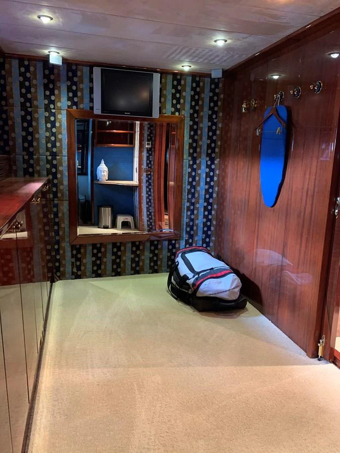 a bedroom with a bed and a backpack aboard 117 BILGIN YACHTS 2007 Yacht for Sale