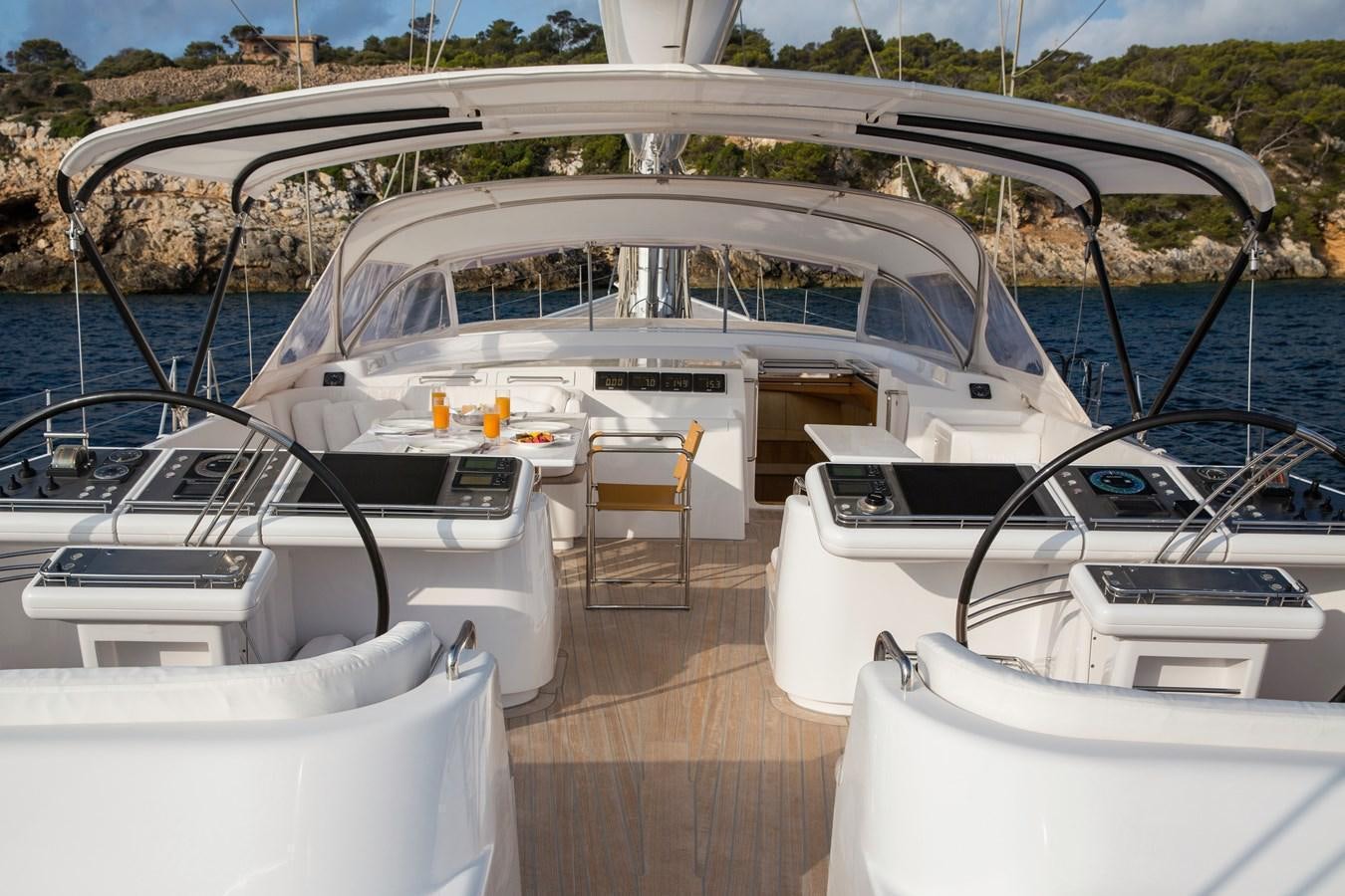 a boat docked at a pier aboard SPIIP Yacht for Sale