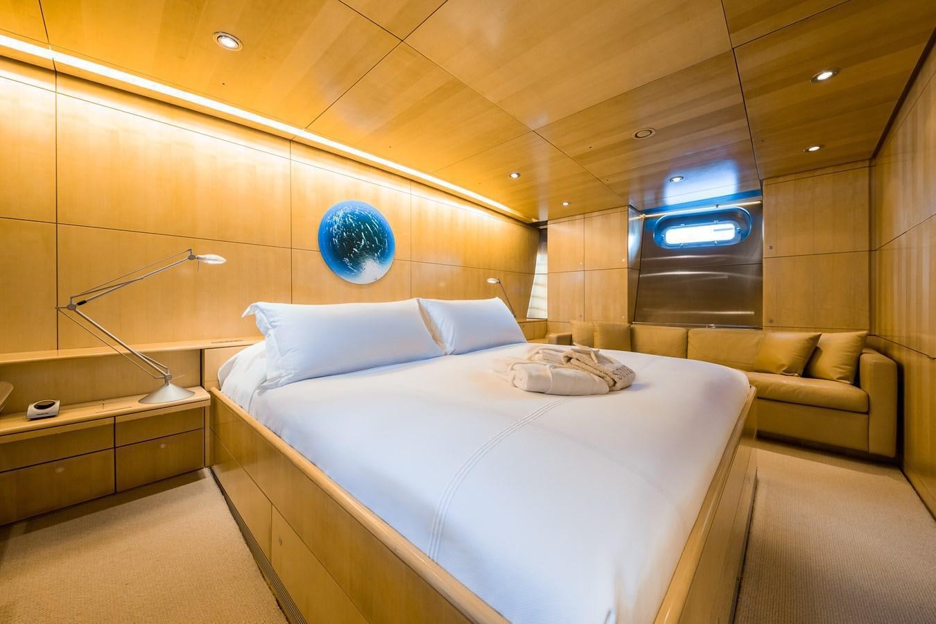 a bed in a room aboard SPIIP Yacht for Sale