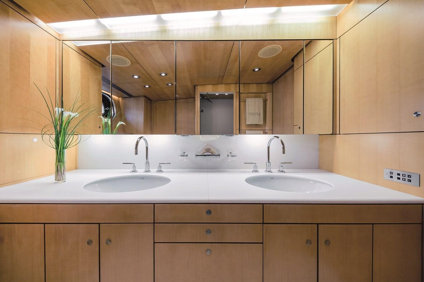 a bathroom with two sinks aboard SPIIP Yacht for Sale