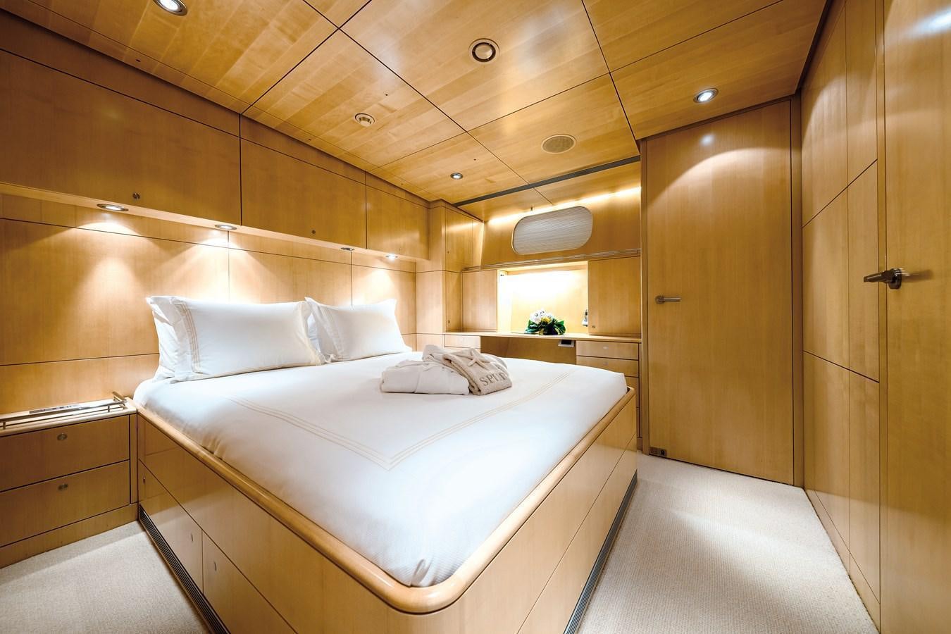 a bed in a room aboard SPIIP Yacht for Sale