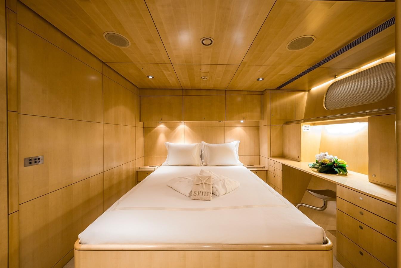 a bed in a room aboard SPIIP Yacht for Sale