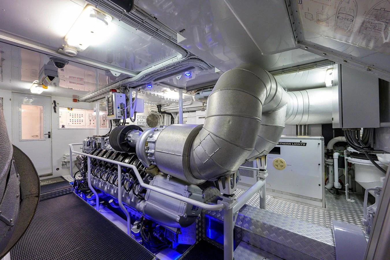 a large machine in a room aboard TEMPO REALE Yacht for Sale