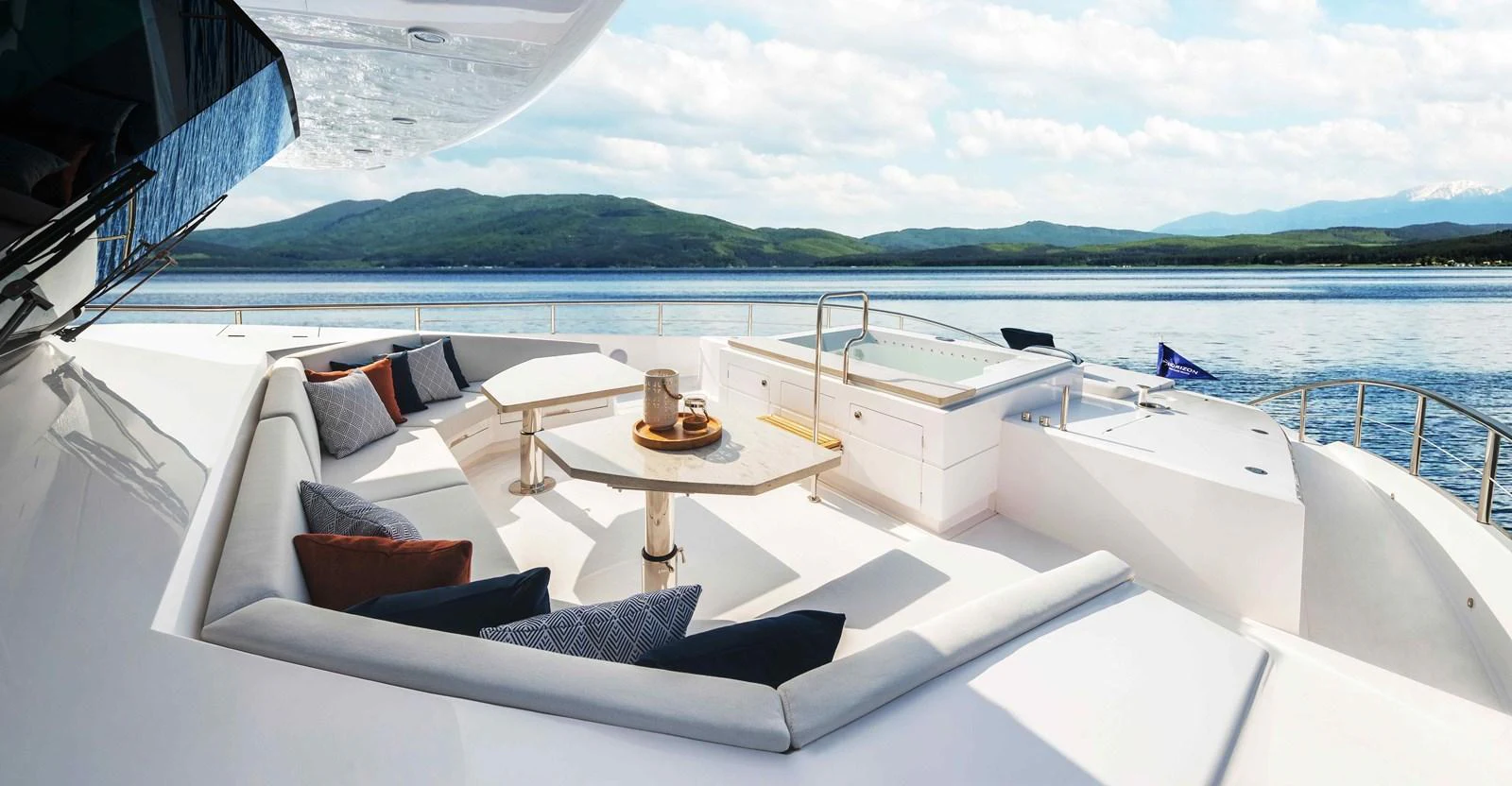 a white yacht on a body of water aboard FD110-004 NEW ARRIVAL Yacht for Sale