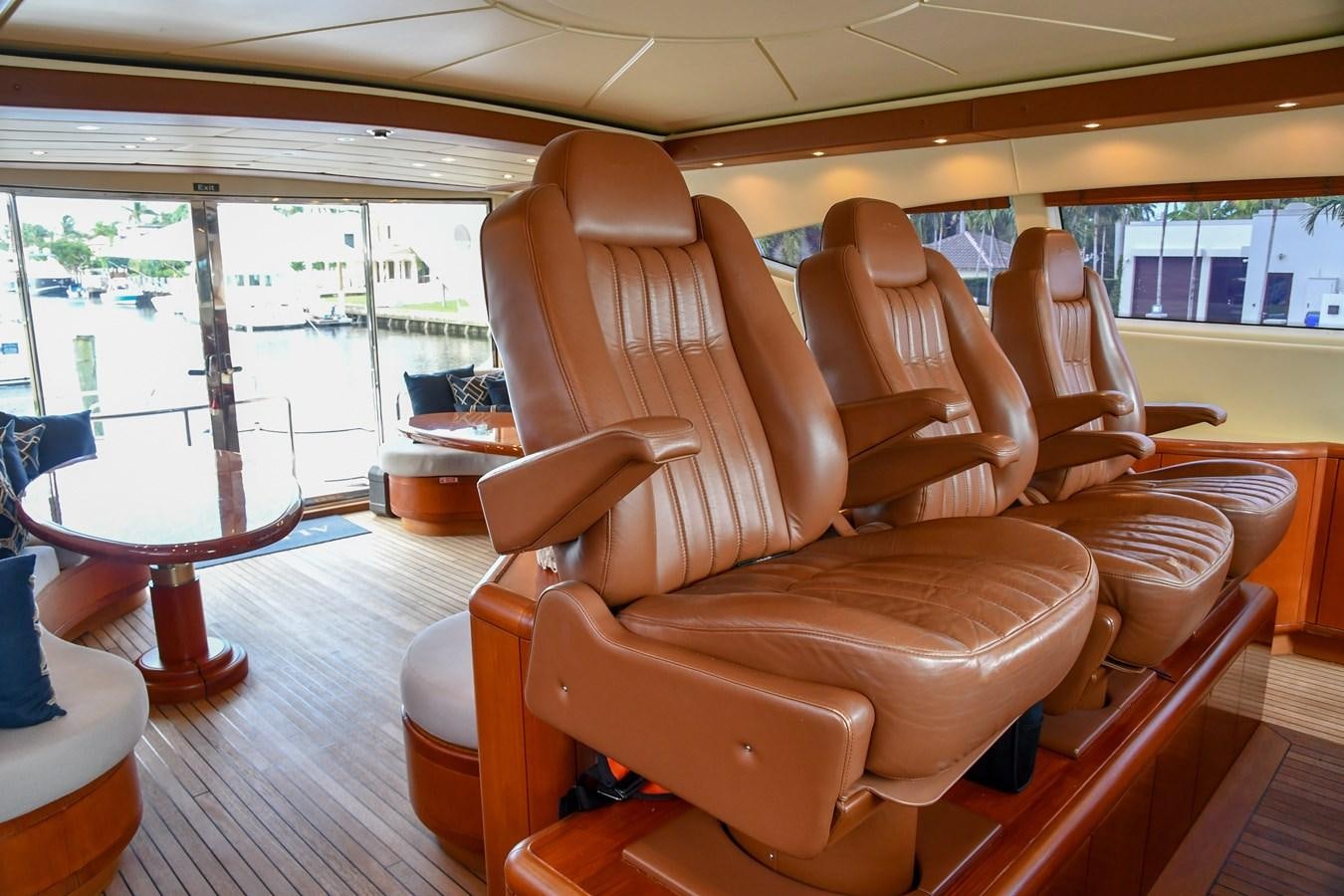 a room with chairs and a table aboard EYE PLAY Yacht for Sale
