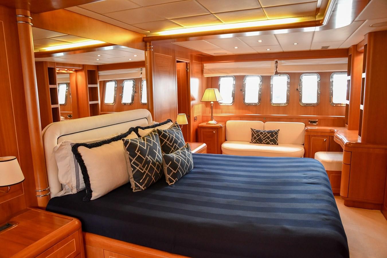 a bed in a room aboard EYE PLAY Yacht for Sale