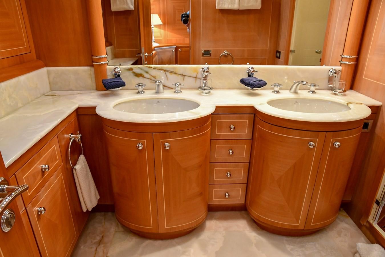 a bathroom with two sinks aboard EYE PLAY Yacht for Sale