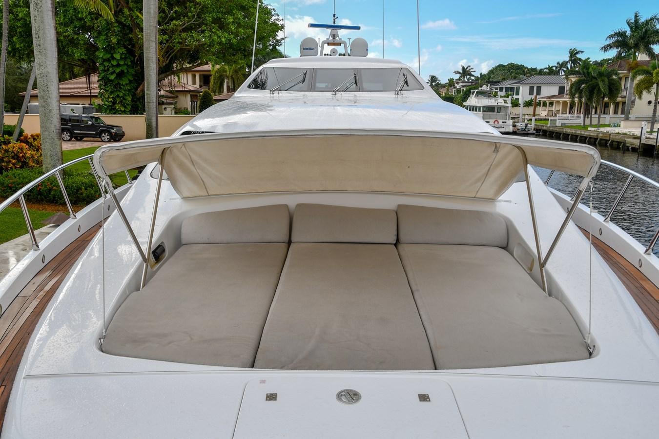 a white car with a roof aboard EYE PLAY Yacht for Sale