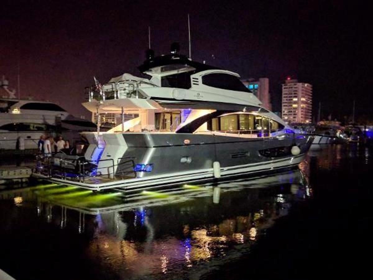 a boat docked at night aboard HAMPTON EURO 830 Yacht for Sale
