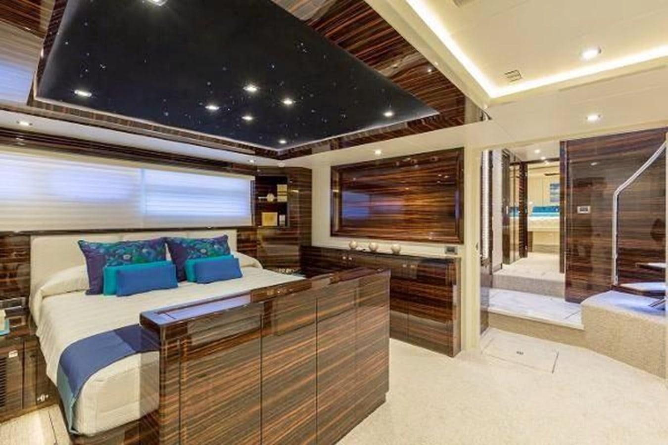 a room with a bed and a large window aboard HAMPTON EURO 830 Yacht for Sale