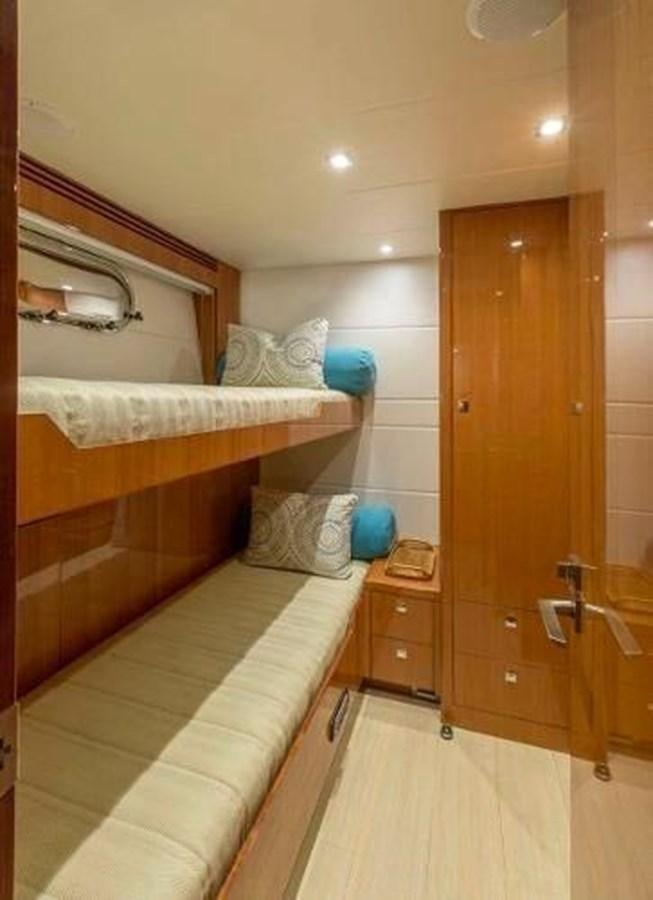 a room with a bed and a closet aboard HAMPTON EURO 830 Yacht for Sale