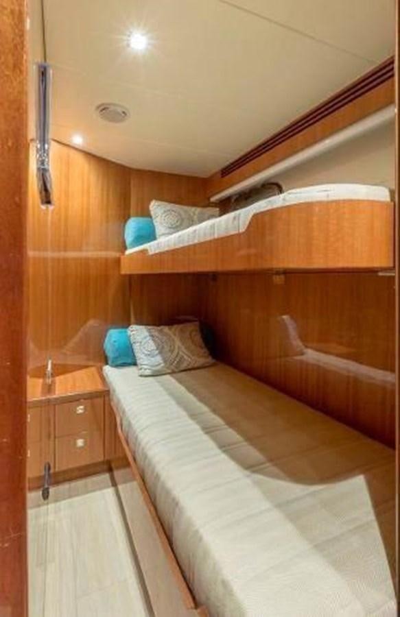 a bed with a wooden frame aboard HAMPTON EURO 830 Yacht for Sale