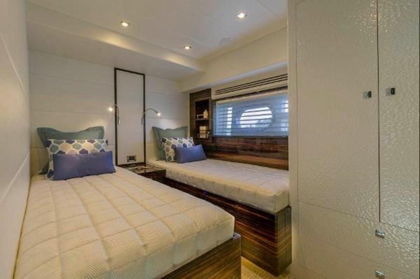 a bedroom with a bed and a tv aboard HAMPTON EURO 830 Yacht for Sale