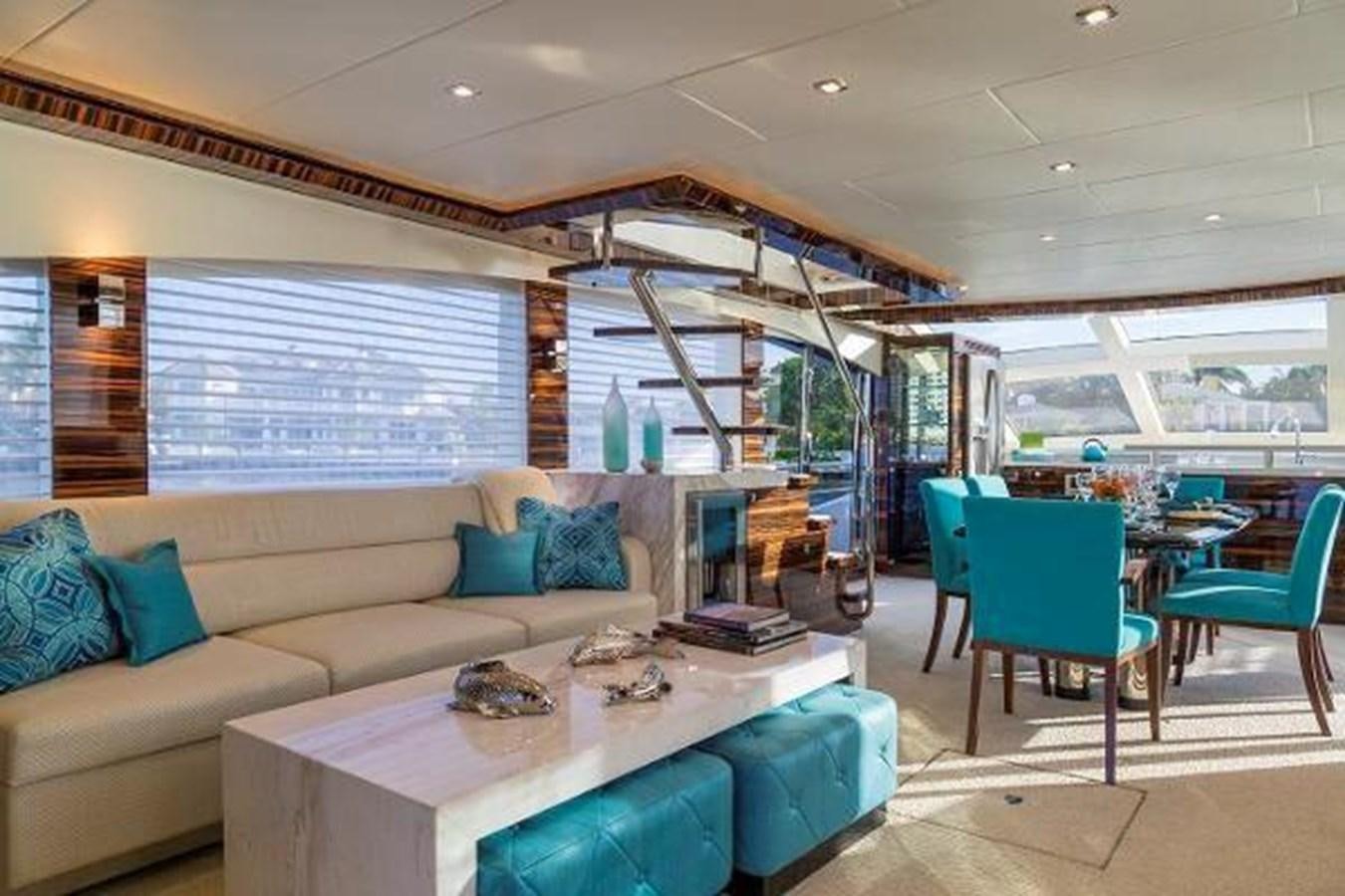 a living room with a couch and a table aboard HAMPTON EURO 830 Yacht for Sale