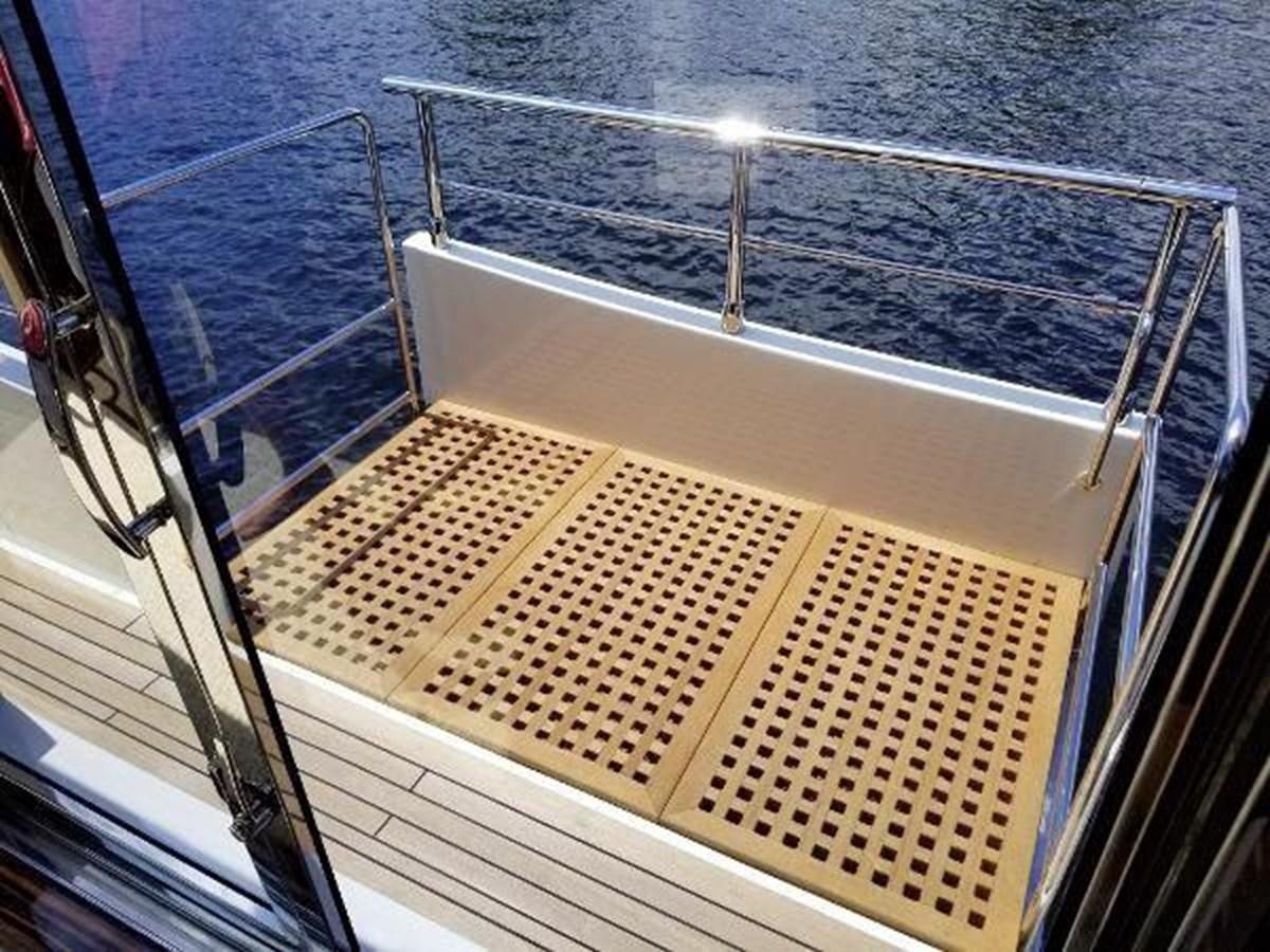 a deck with a railing and a railing on the side aboard HAMPTON EURO 830 Yacht for Sale
