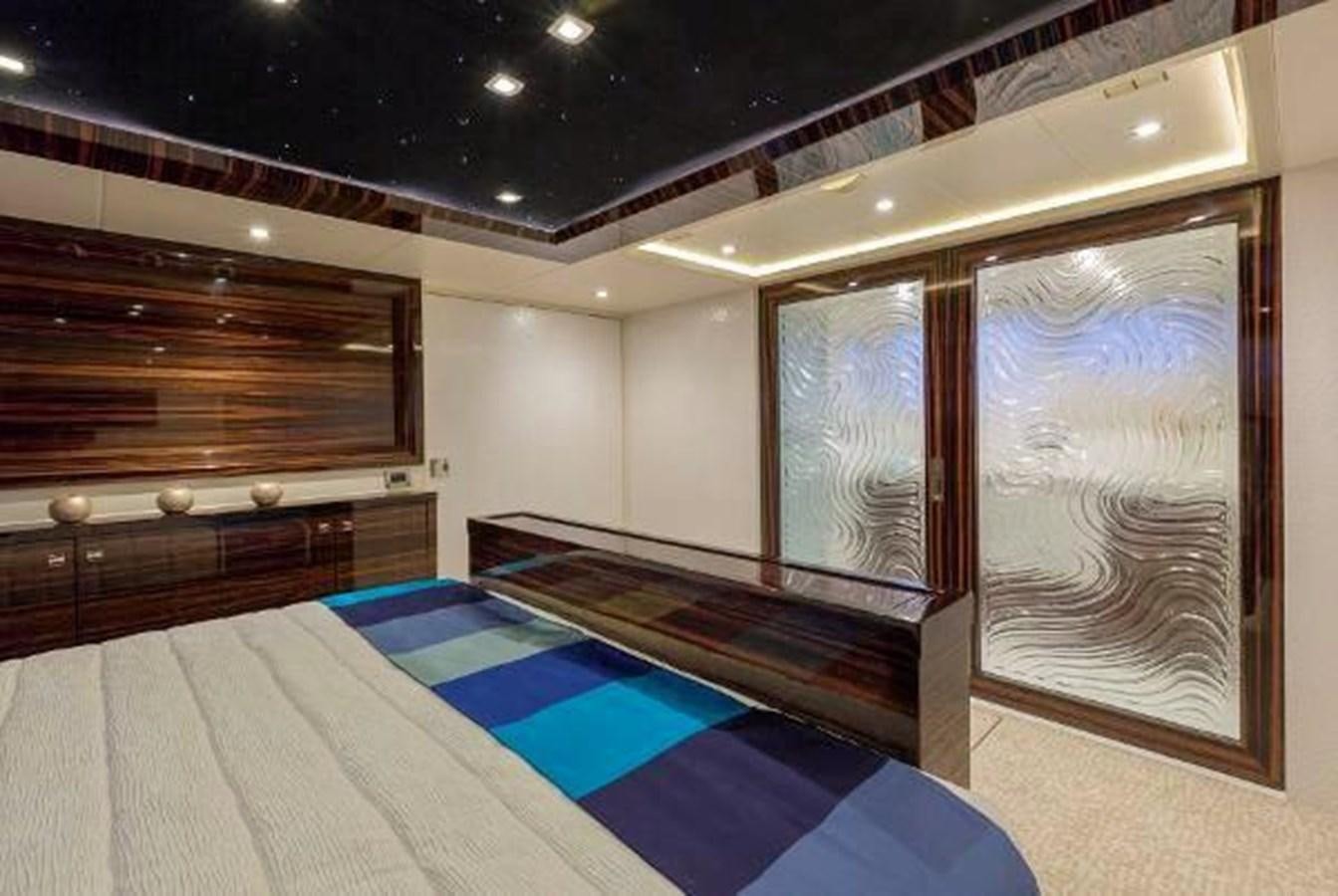 a room with a bed and a mirror aboard HAMPTON EURO 830 Yacht for Sale