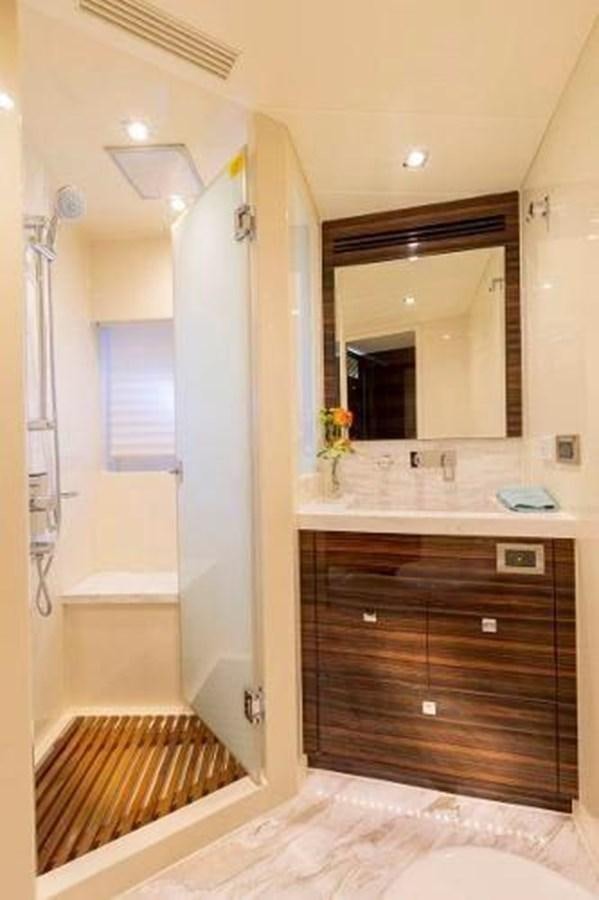 a bathroom with a sink and a mirror aboard HAMPTON EURO 830 Yacht for Sale